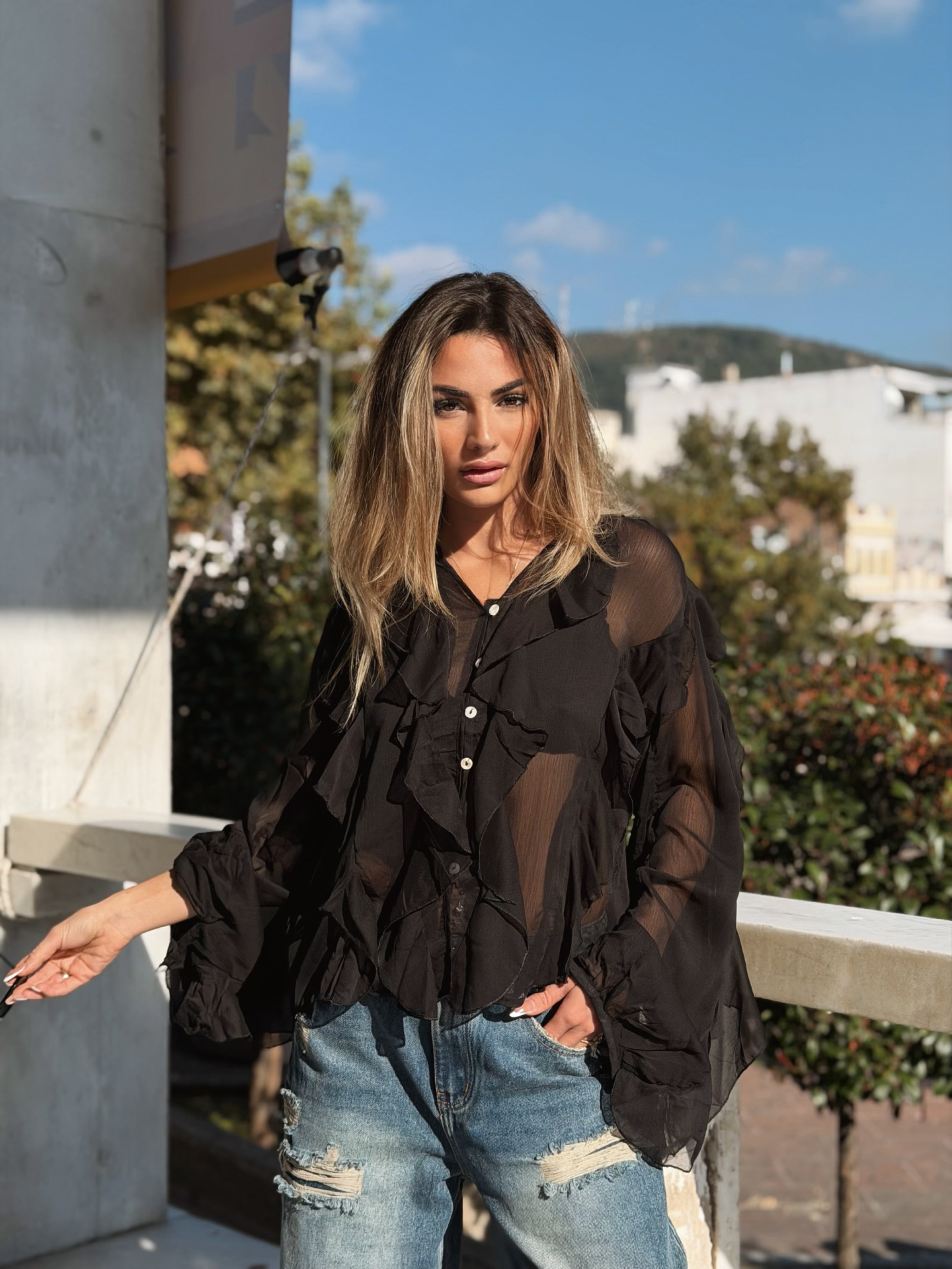 Volangblus med snäckknappar