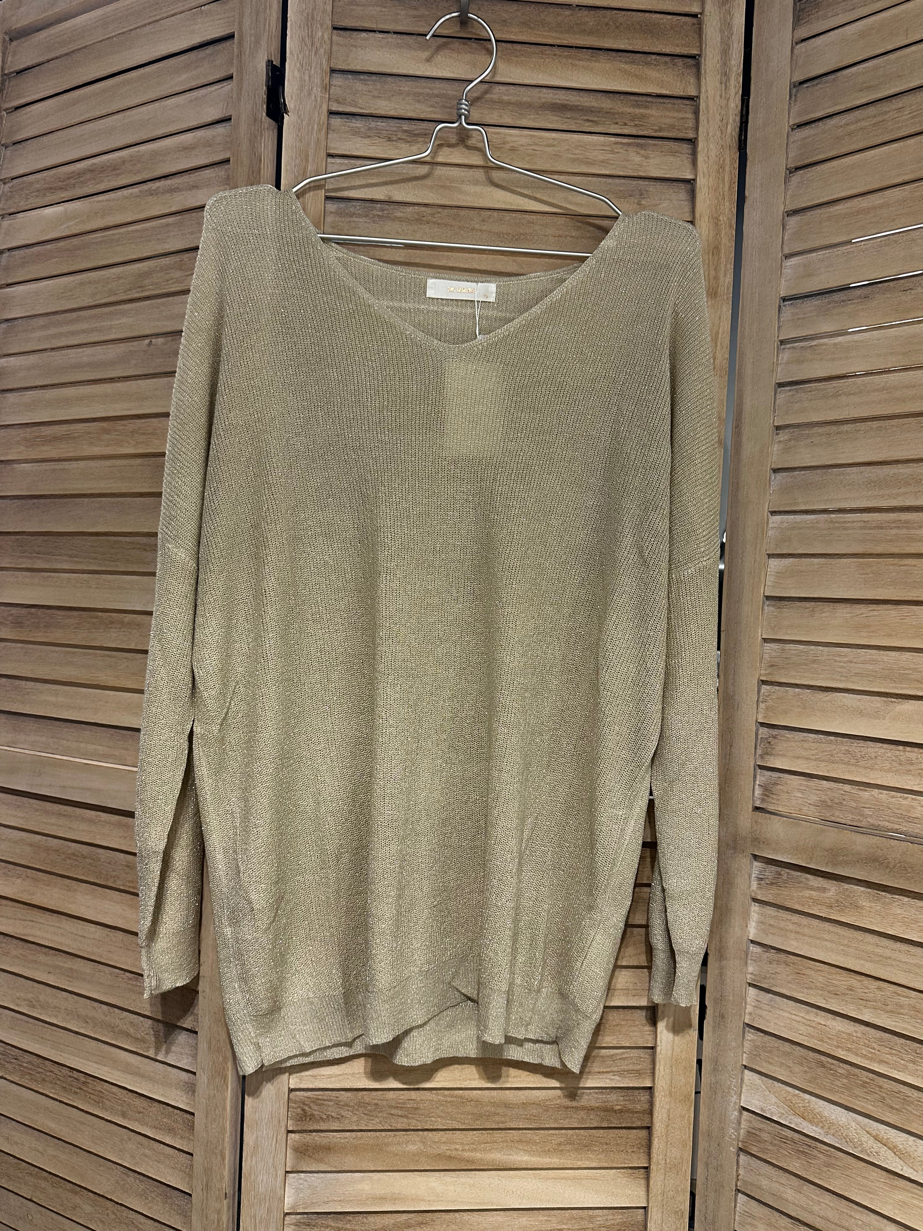 Stickad glittrig tröja