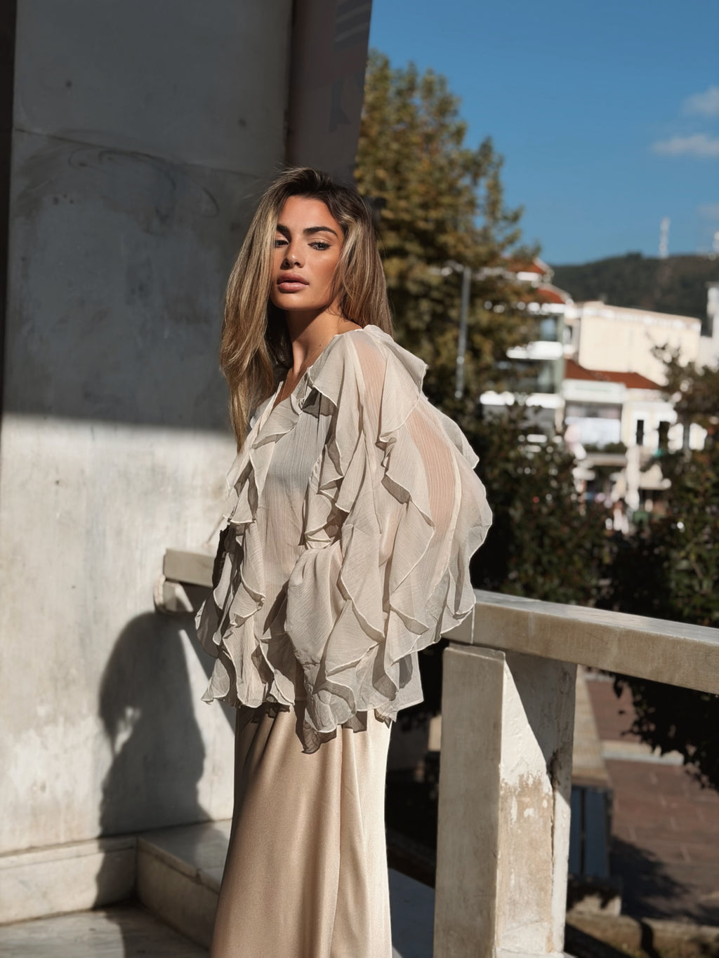 Volangblus med snäckknappar