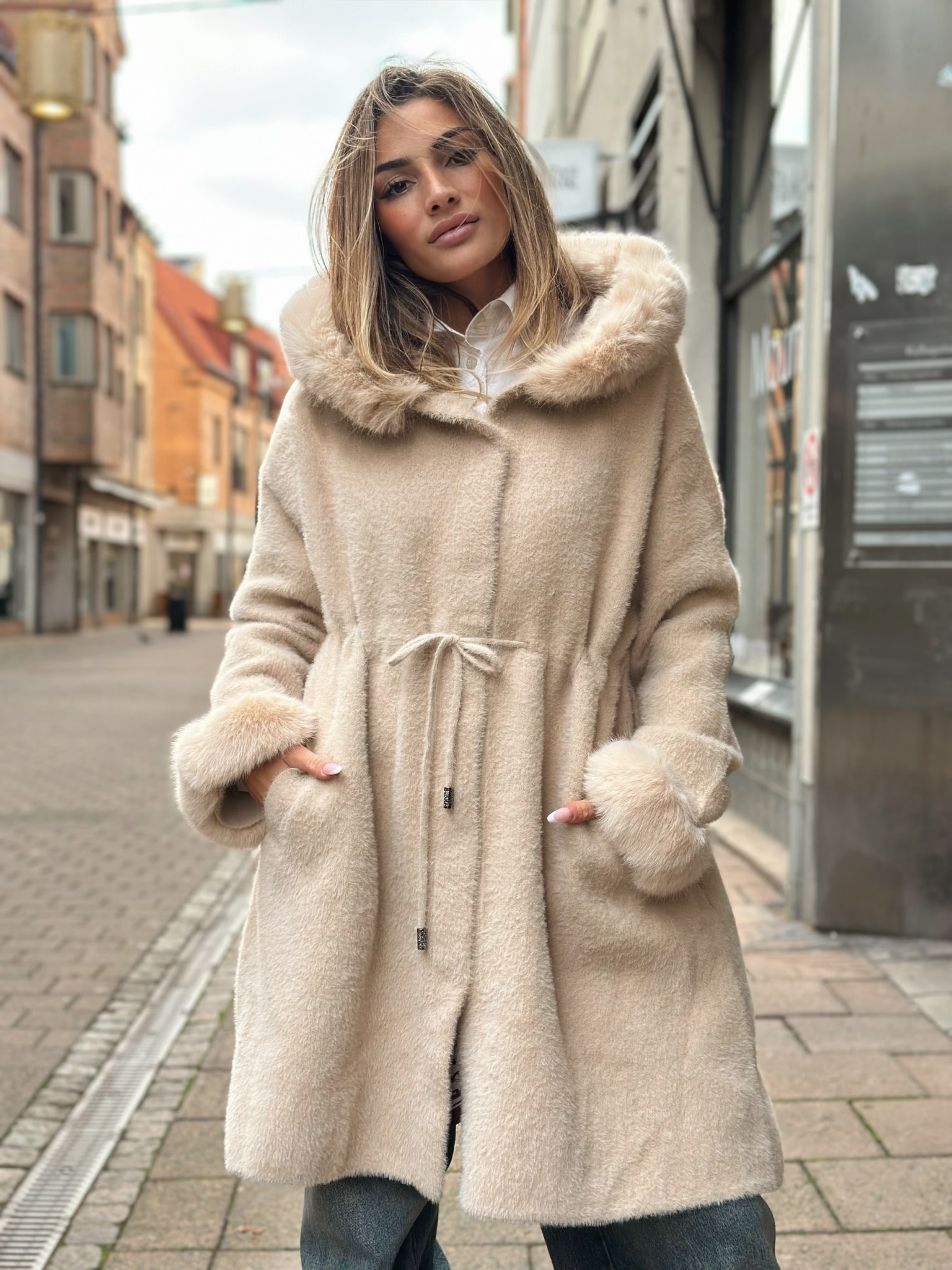 Kappa med fuskpälskant