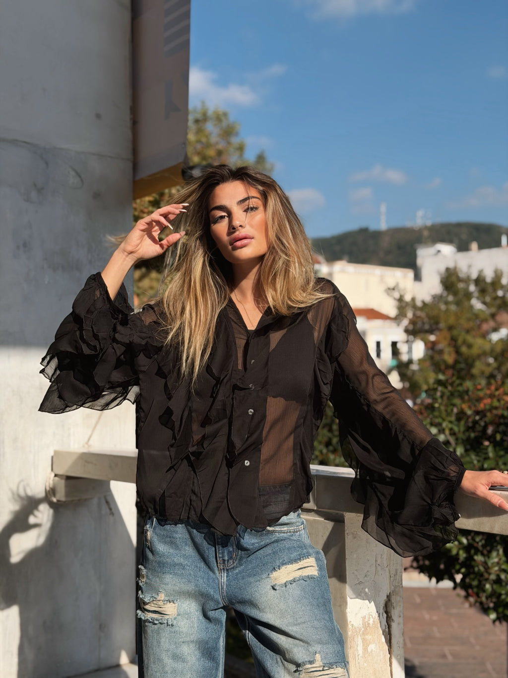 Volangblus med snäckknappar