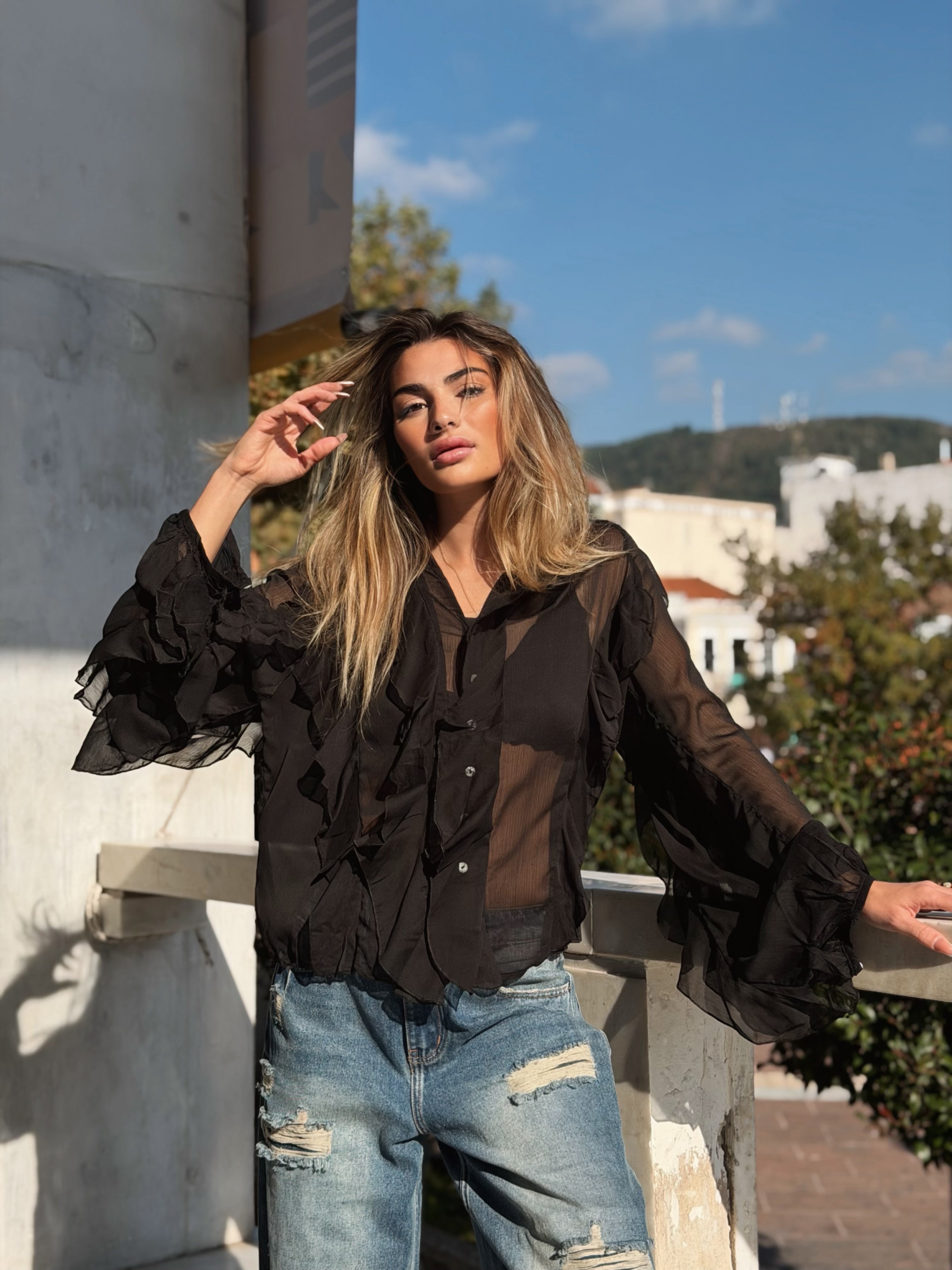 Volangblus med snäckknappar