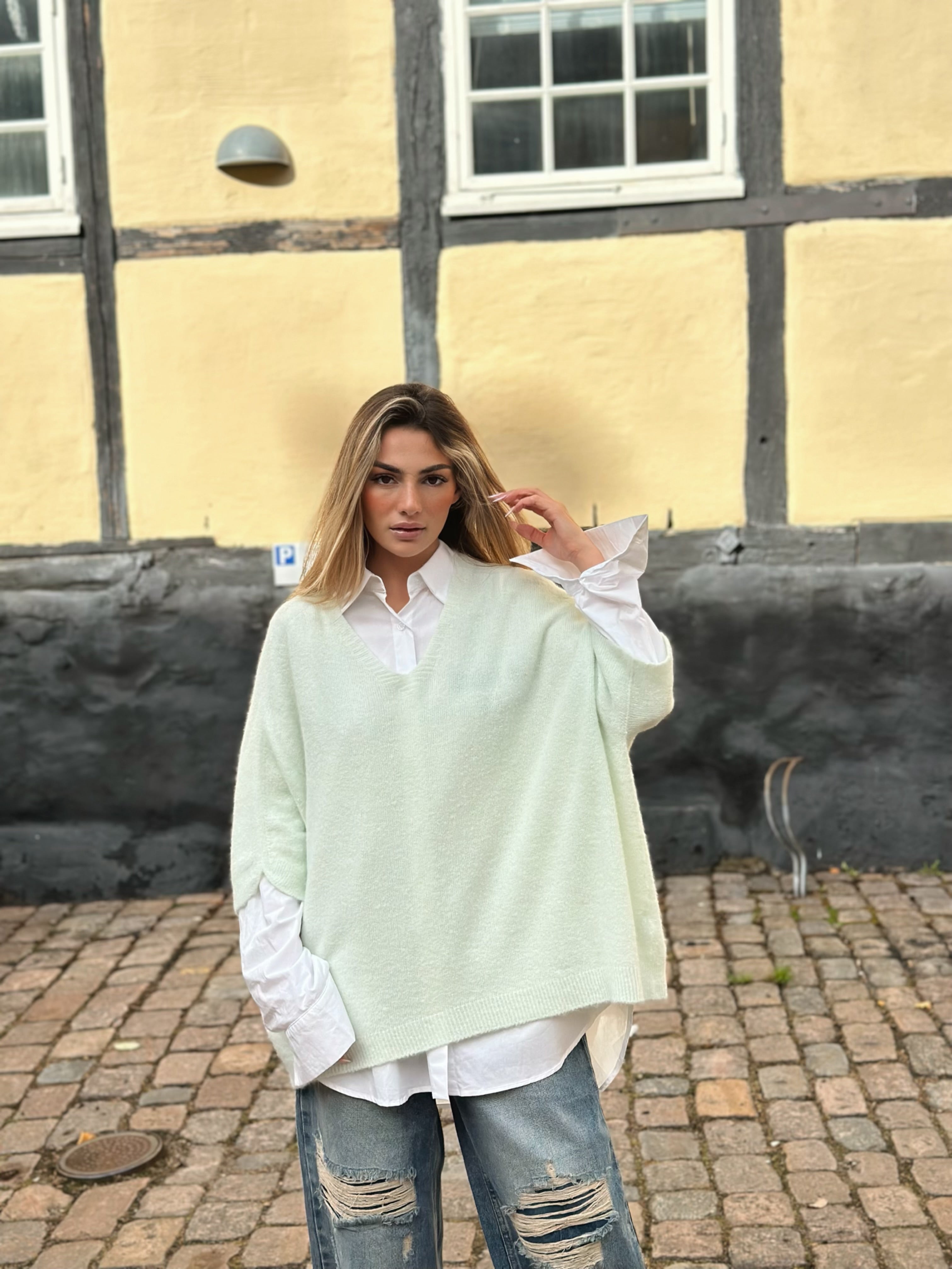 Ponchotröja med V-ringning