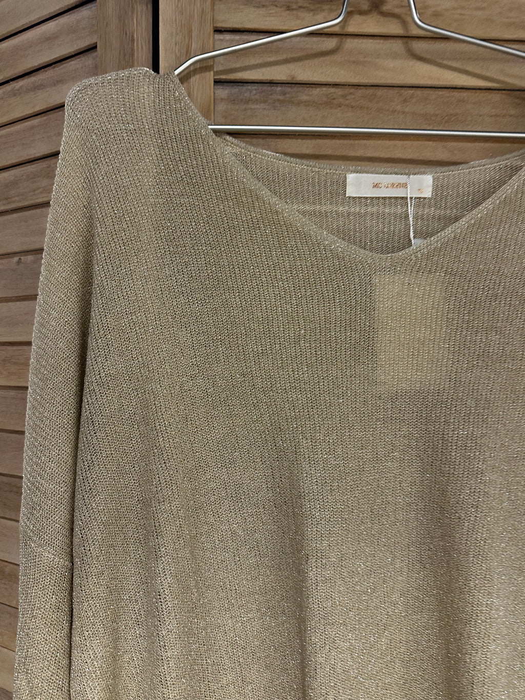 Stickad glittrig tröja