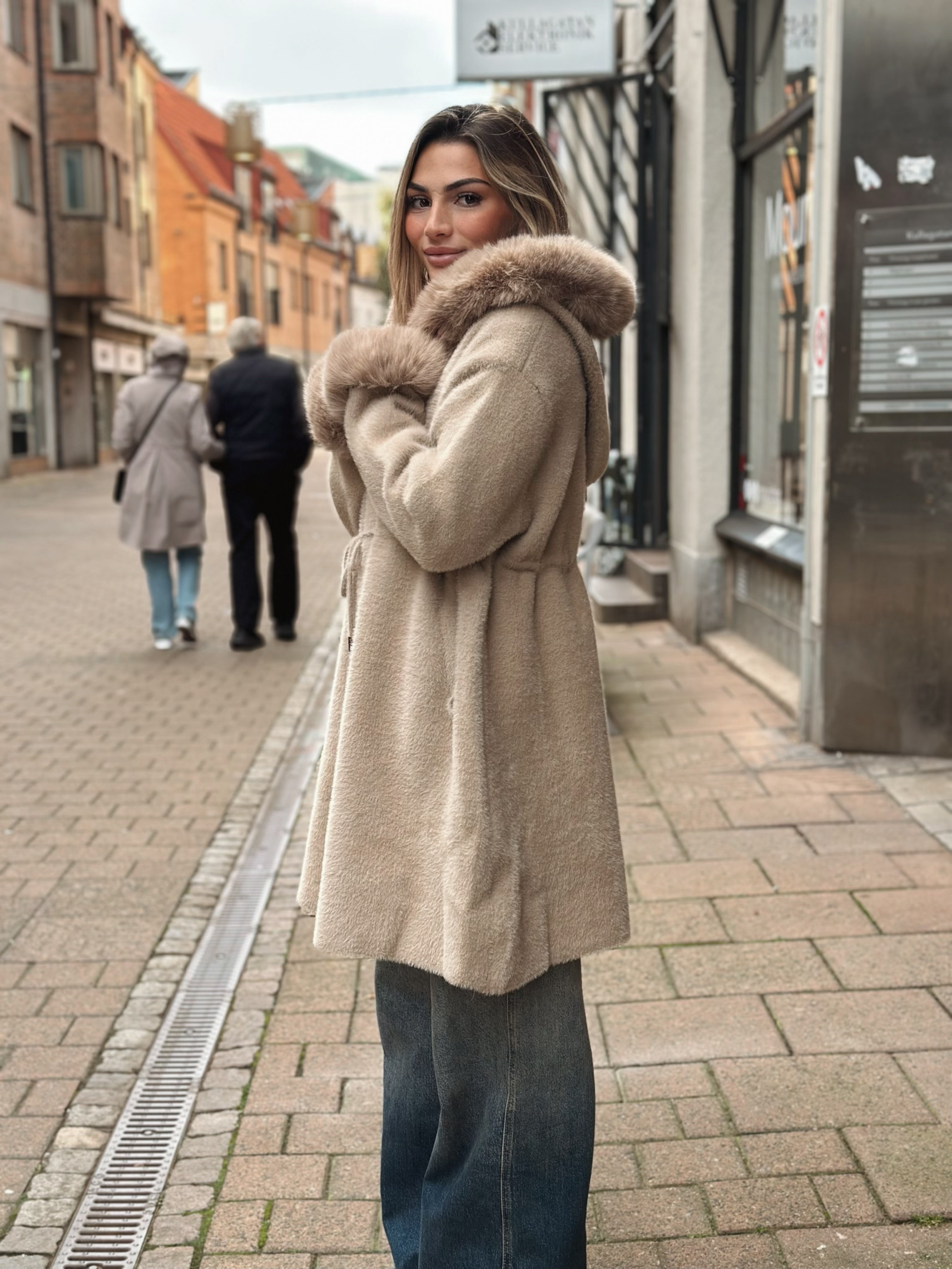 Kappa med fuskpälskant