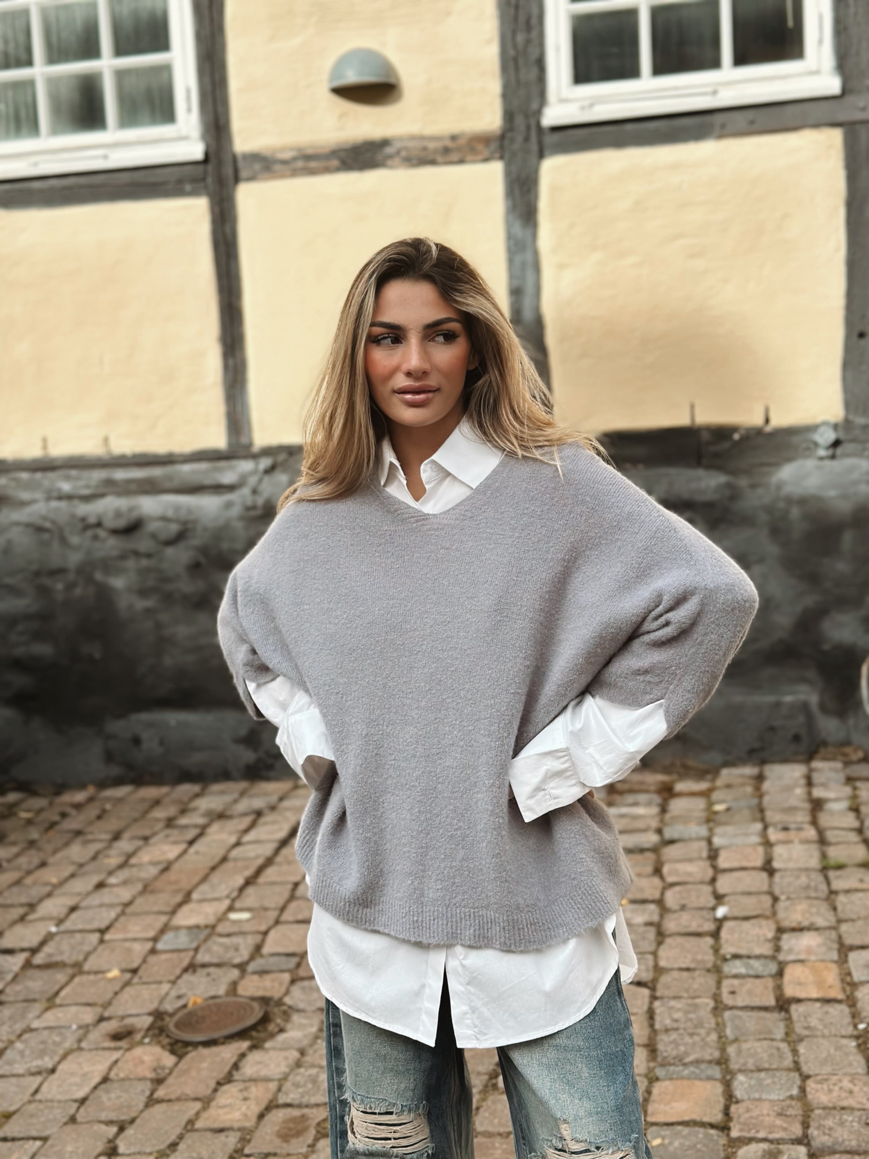 Ponchotröja med V-ringning