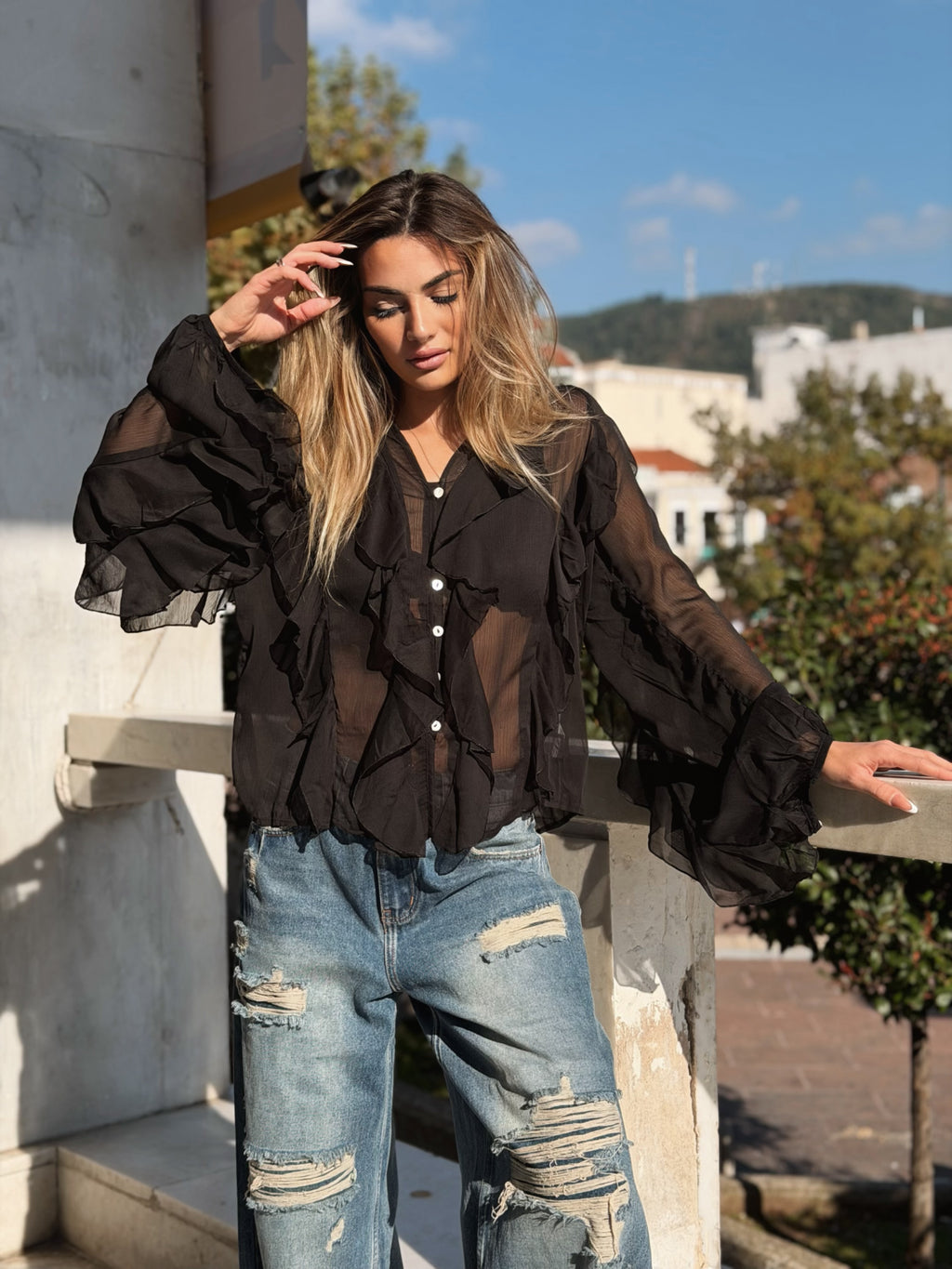 Volangblus med snäckknappar