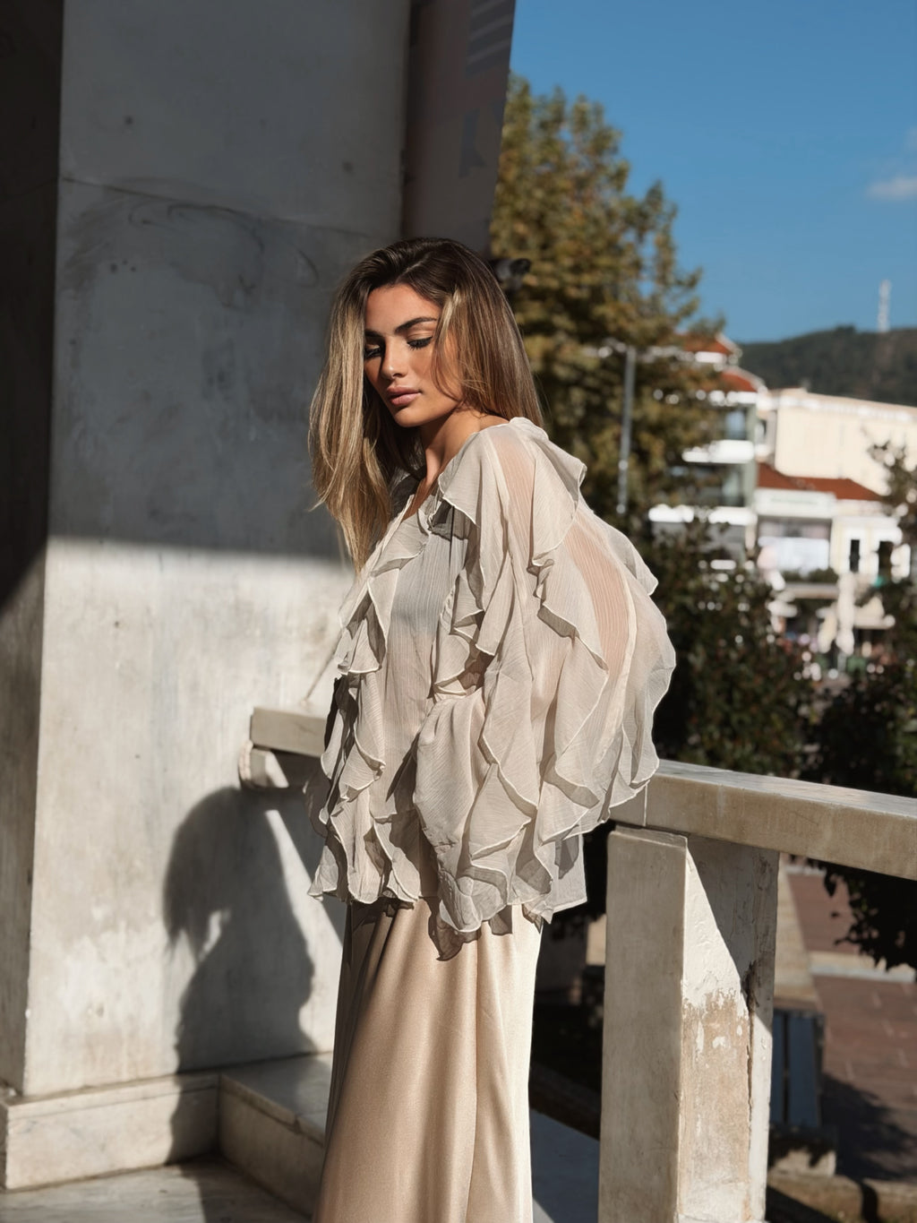 Volangblus med snäckknappar