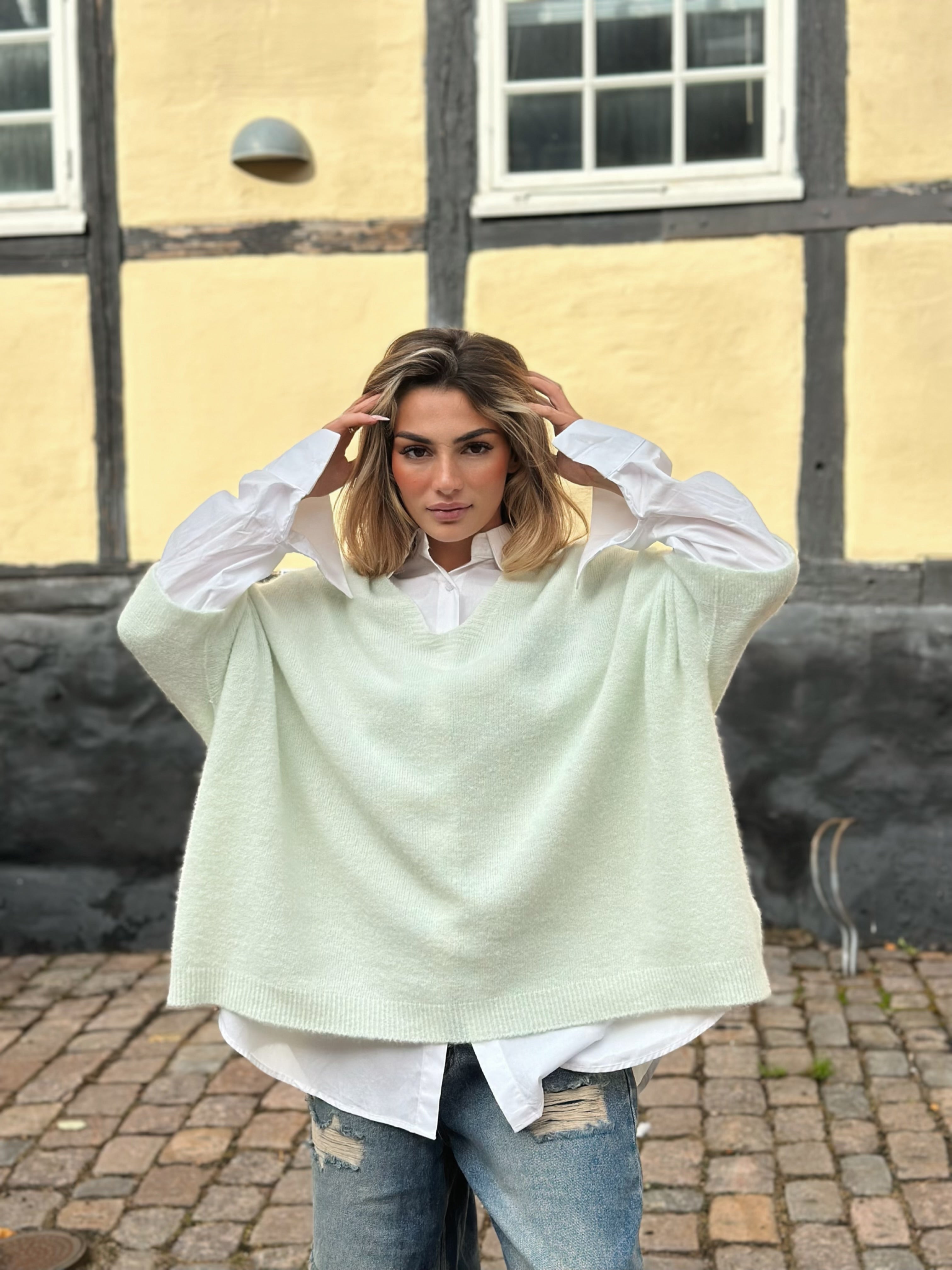 Ponchotröja med V-ringning