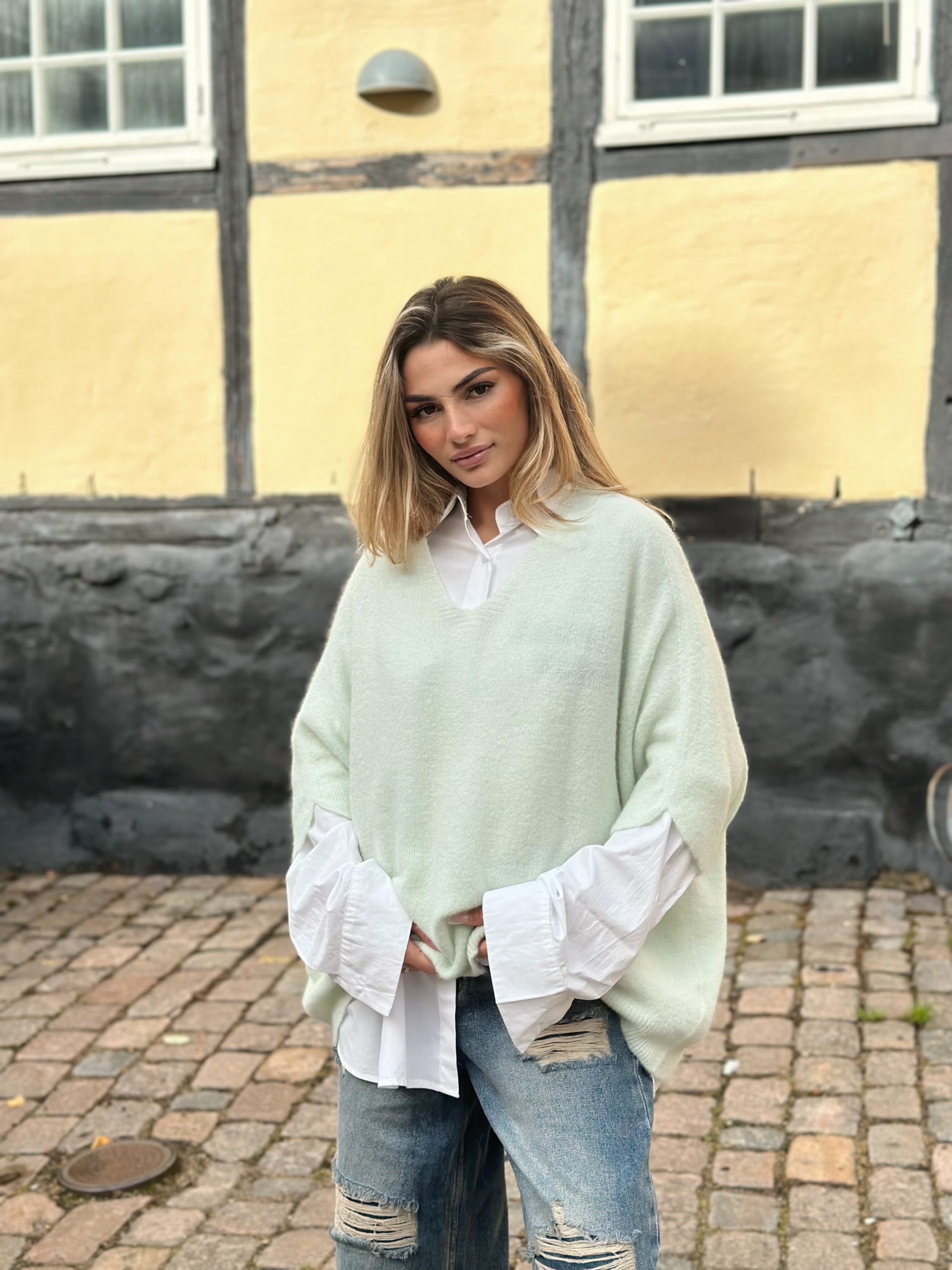 Ponchotröja med V-ringning