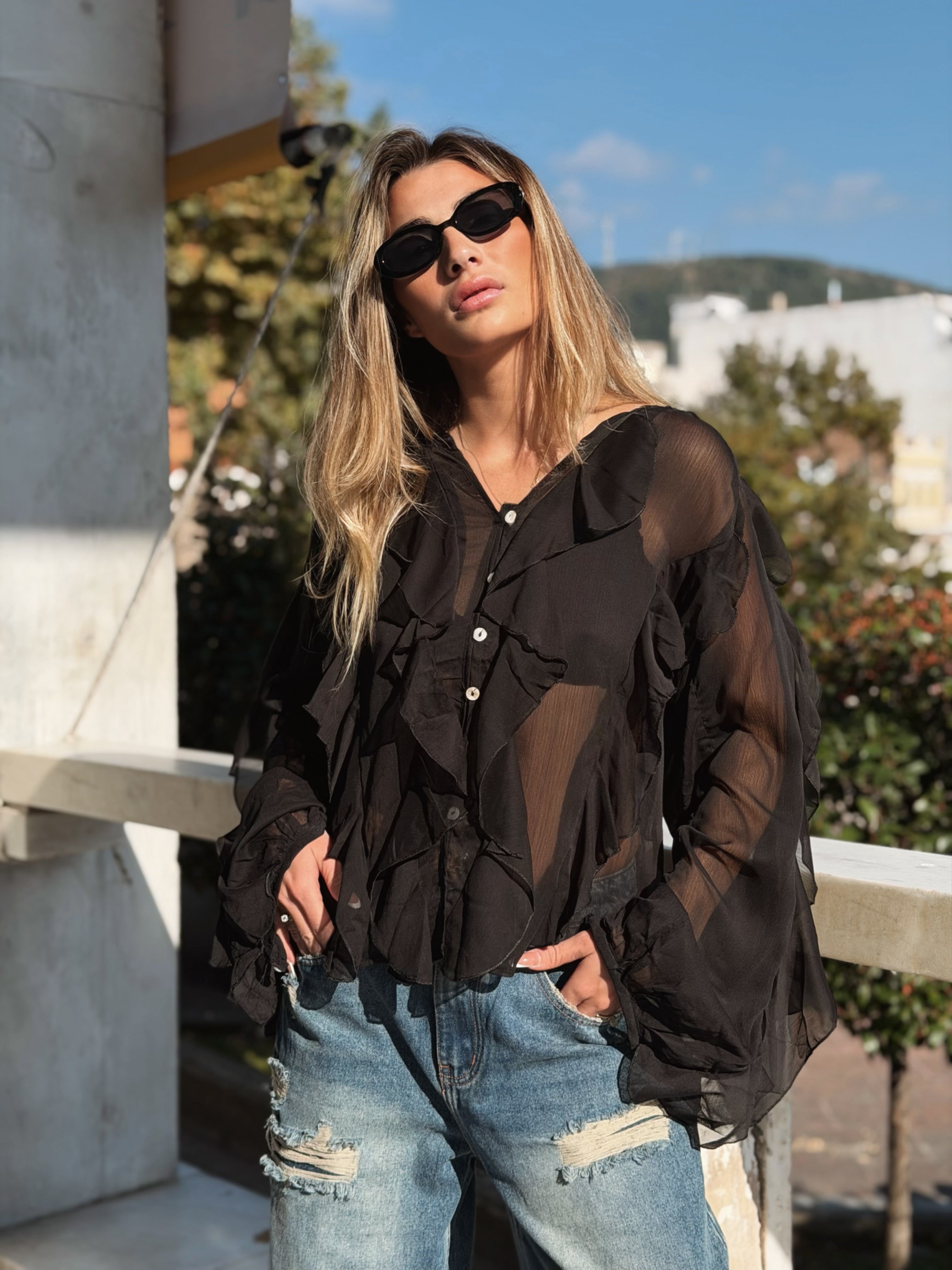 Volangblus med snäckknappar