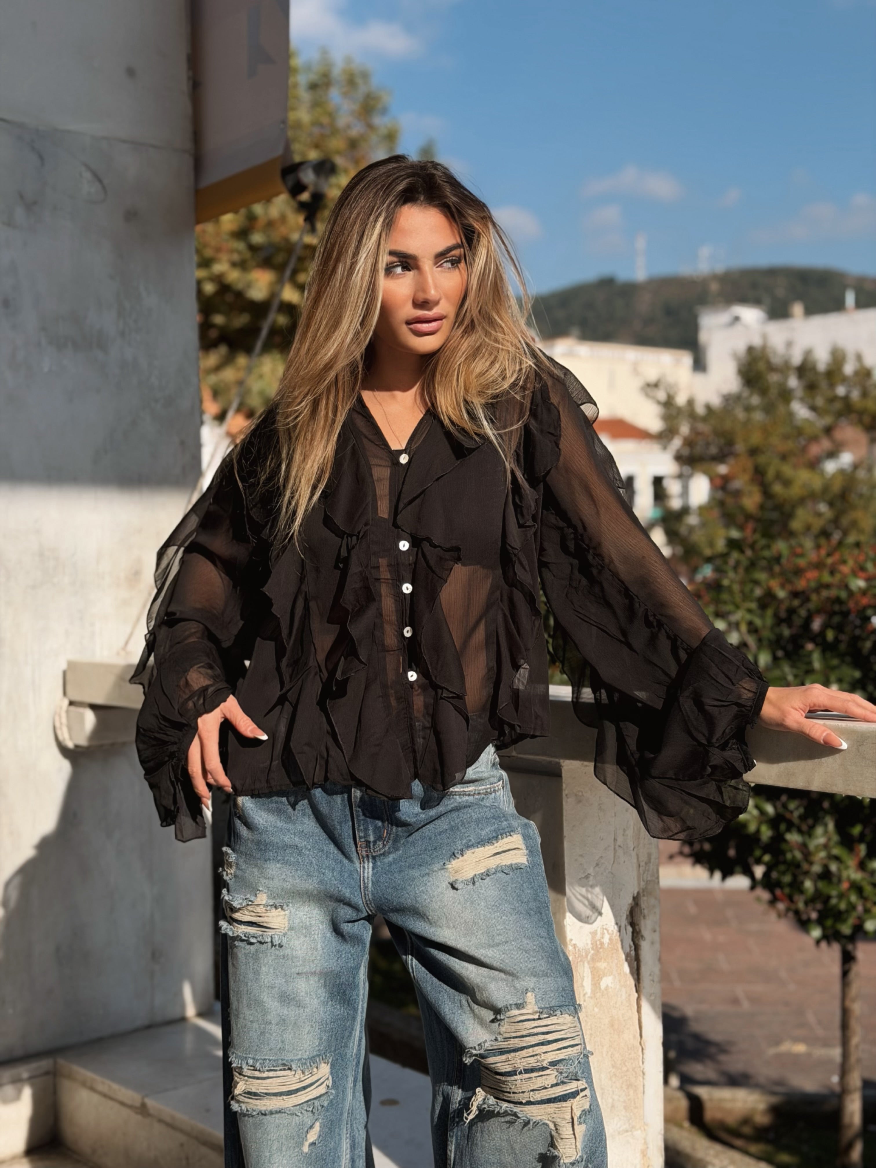 Volangblus med snäckknappar